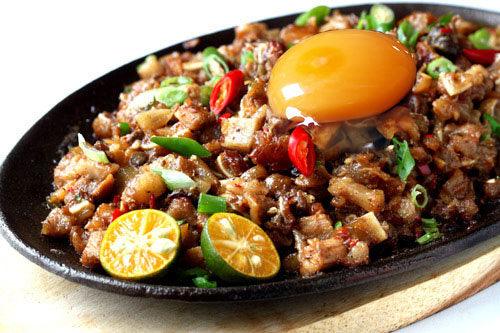 Sizzling Secrets: The Irresistible Crispiness of Filipino Sisig Uncovered! - Tito Boy's Jerky